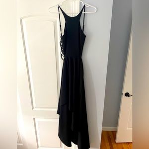 Black gown from hello molly, open back with straps. Very sexy worn once.